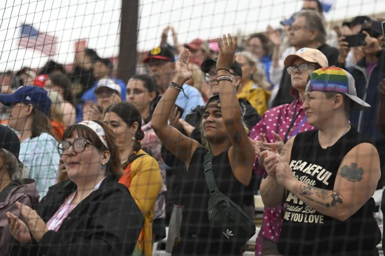 Women's Professional Baseball League makes a rainy debut in front of enthusiastic crowd